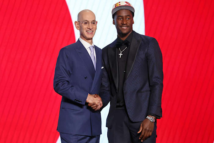 A.J. Griffin (Duke) shakes hands with NBA commissioner Adam Silver after being selected as the number sixteen overall pick by the Atlanta Hawks in the first round of the 2022 NBA Draft at Barclays Center.